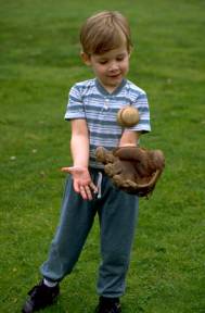 Boy catching baseball