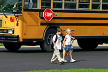 School children leaving school bus photo