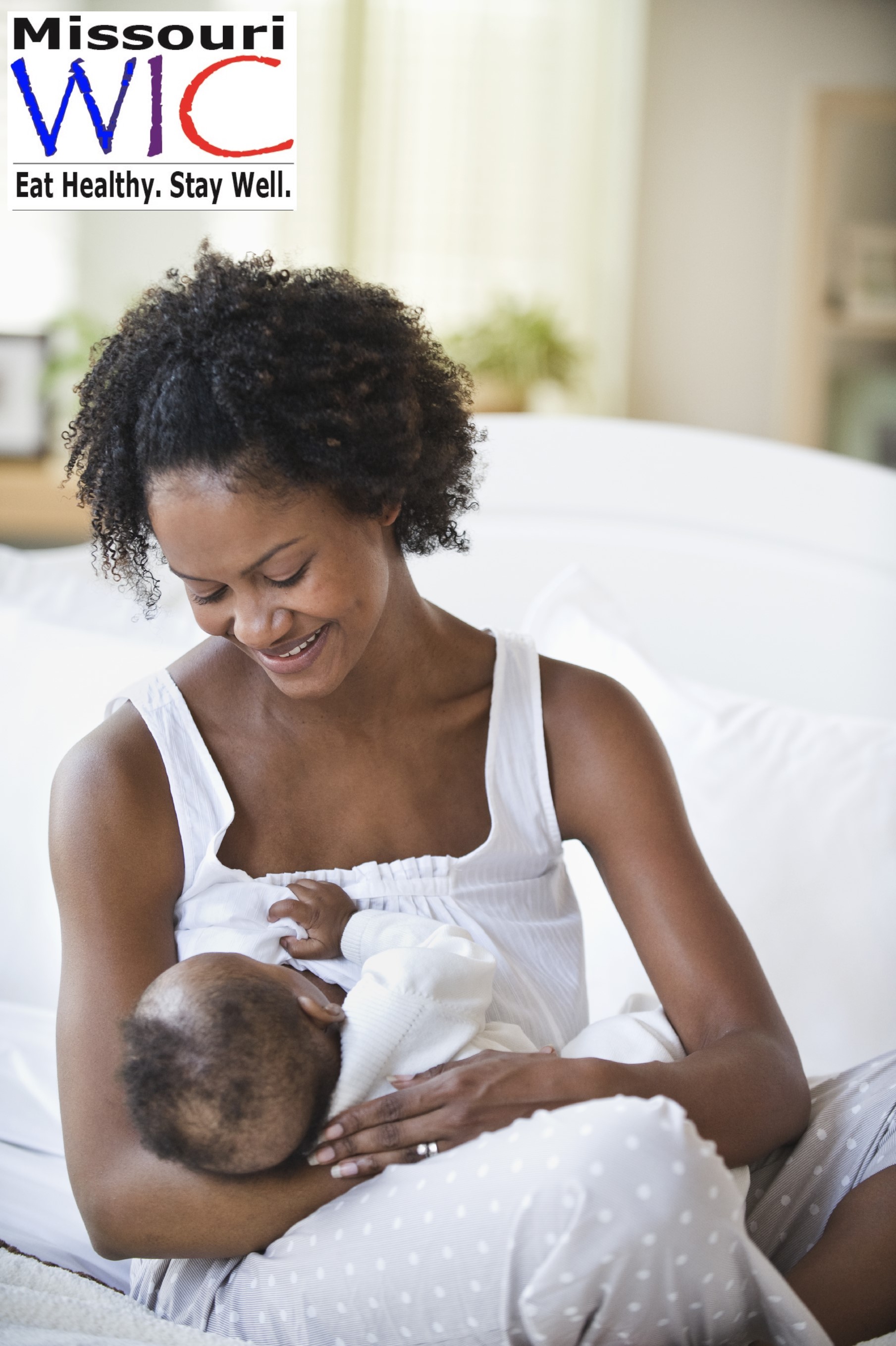 woman breastfeeding baby image 1