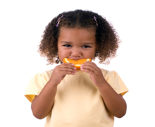girl eating fruit