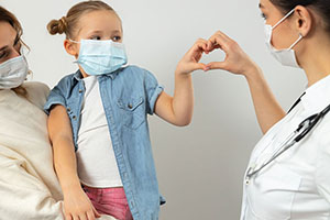 Mother and child wearing masks