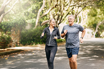 man and woman jogging