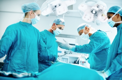 doctors performing surgery in operating room