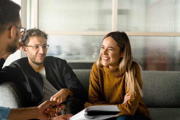 man and woman conversing