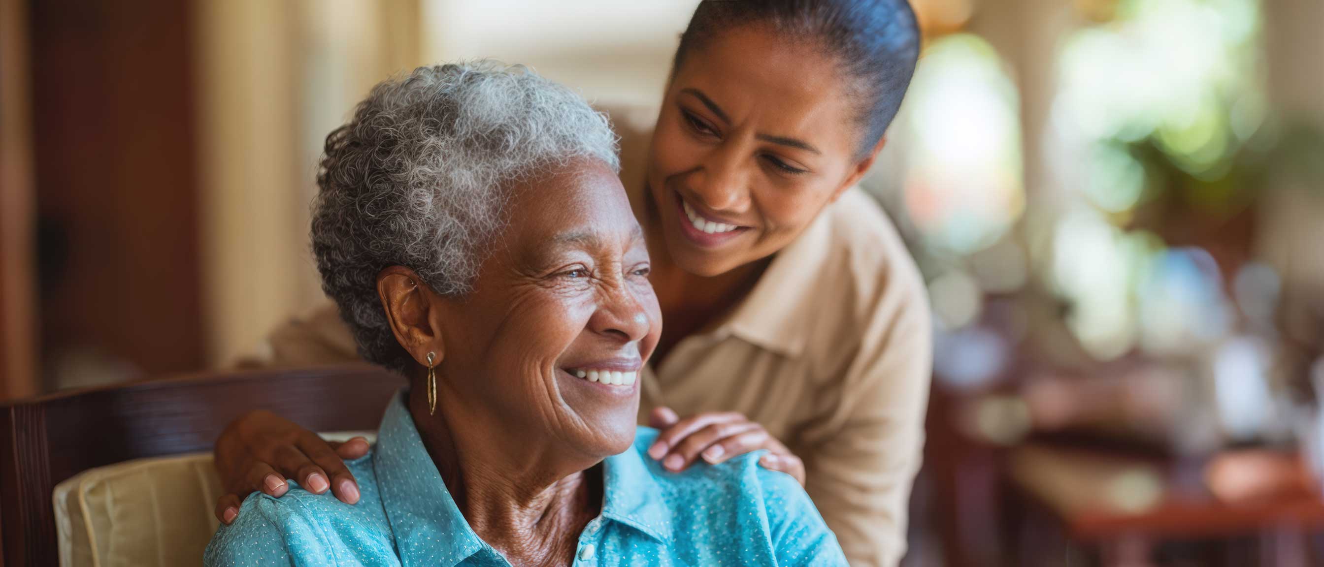 Woman talking to older woman