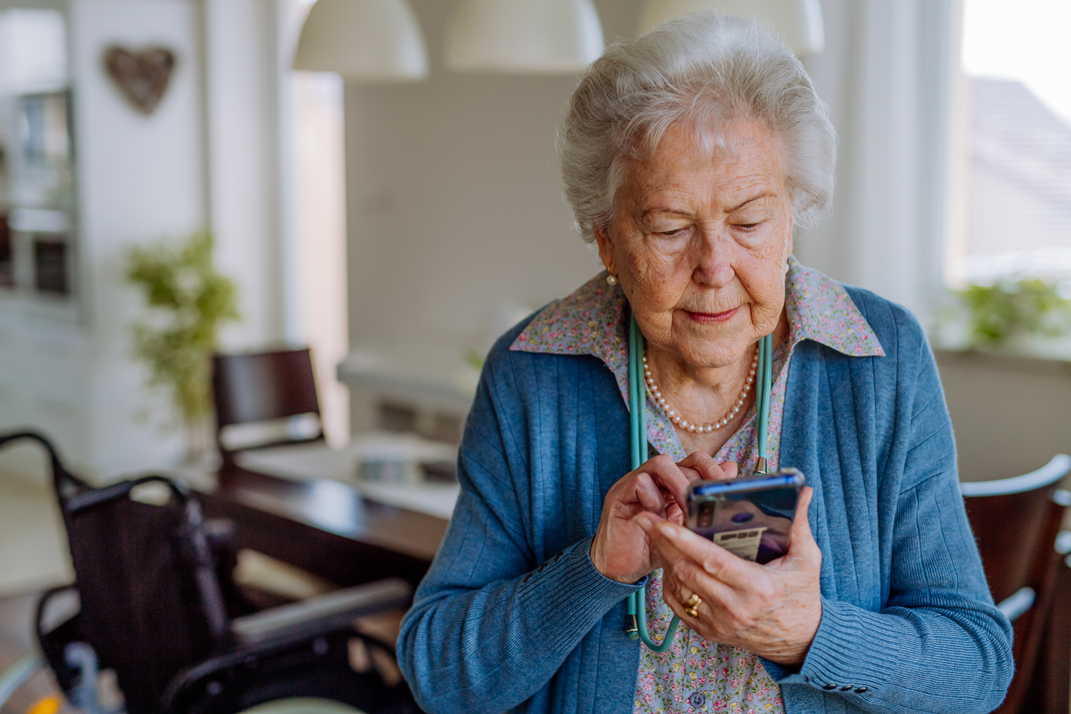 Old woman on phone reporting abuse