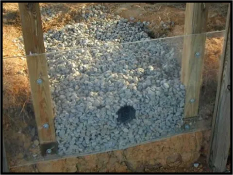 Image of a conventional gravel trench with 4” inch perforated pipe.